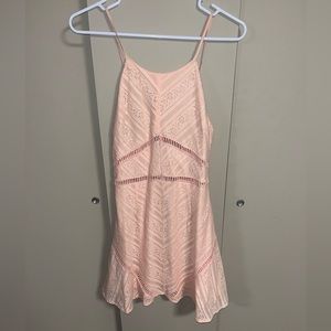 Light pink lace dress with spaghetti straps.